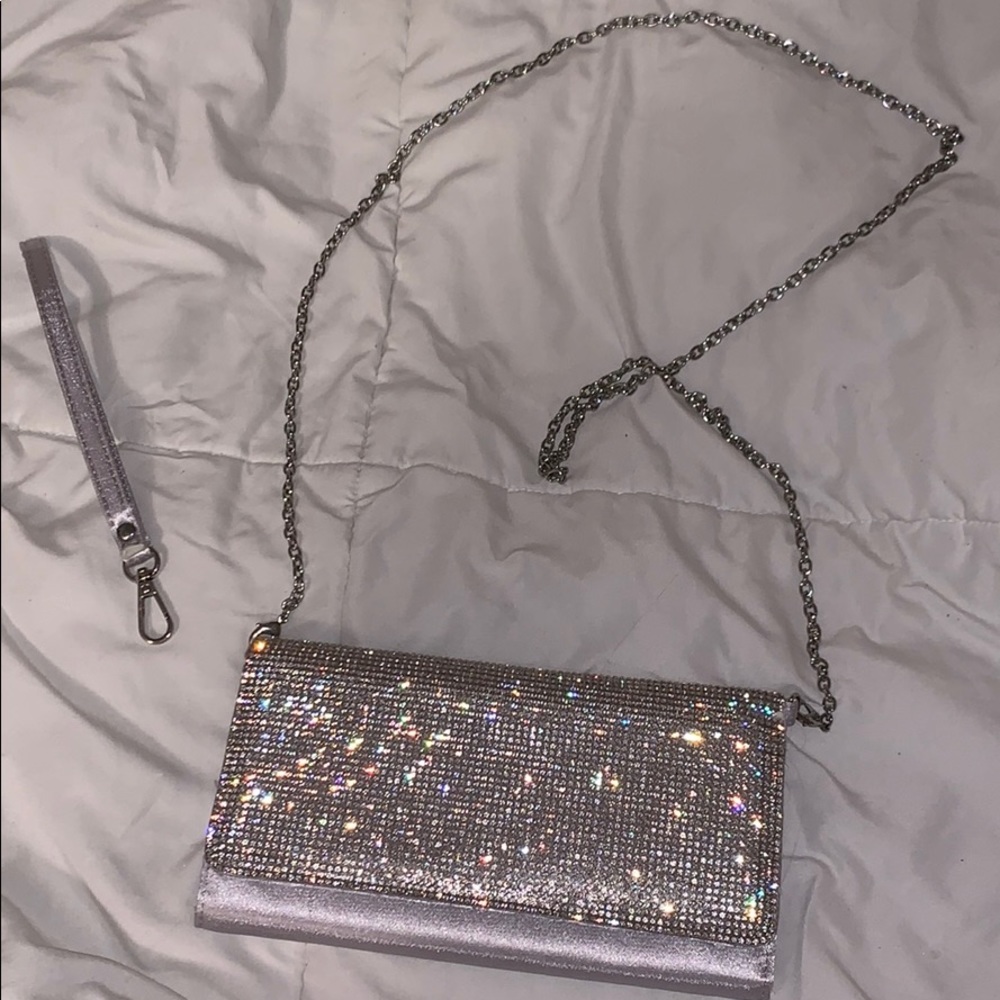 Clutch hand bag with wrist strap